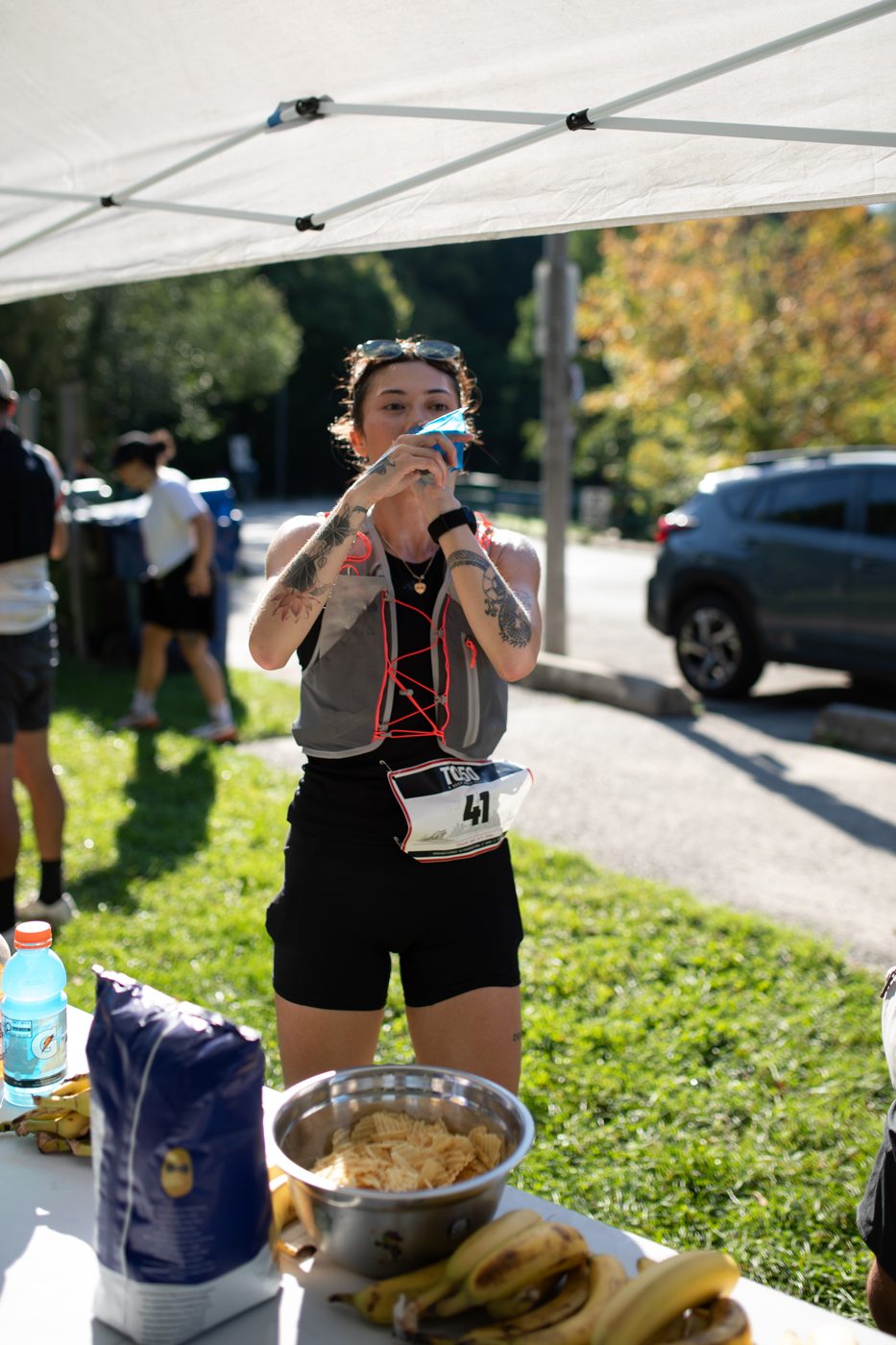 Runners refuelling at the halfway aid station of the TO50 Toronto ultramarathon